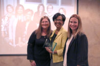 Reed poses with fellow winners of the Women in Business award