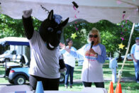 Onyx the horse gives a thumbs up as President King announces her as the new mascot.