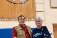 Morg and Nancy holding a basketball in the Knorele Center